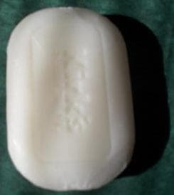 A pale bar of castile soap